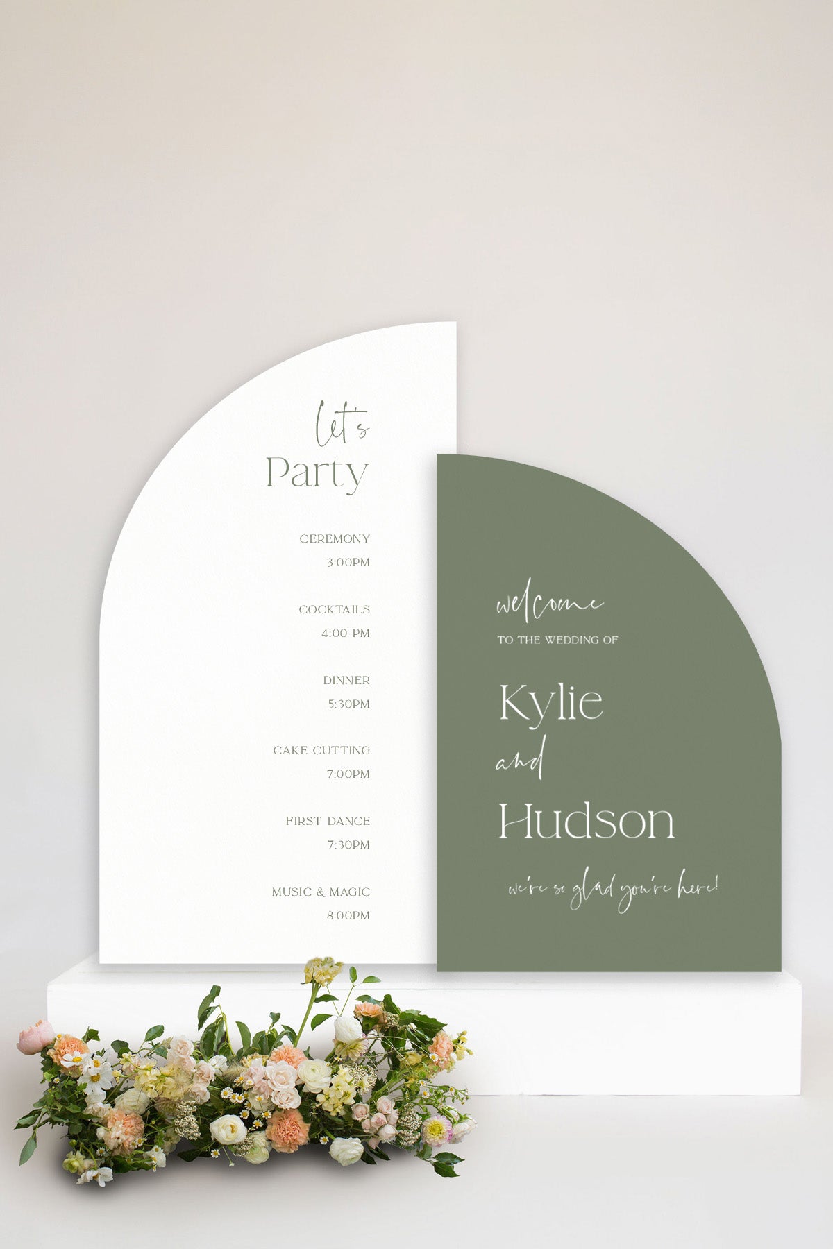 a white and green wedding suite with flowers