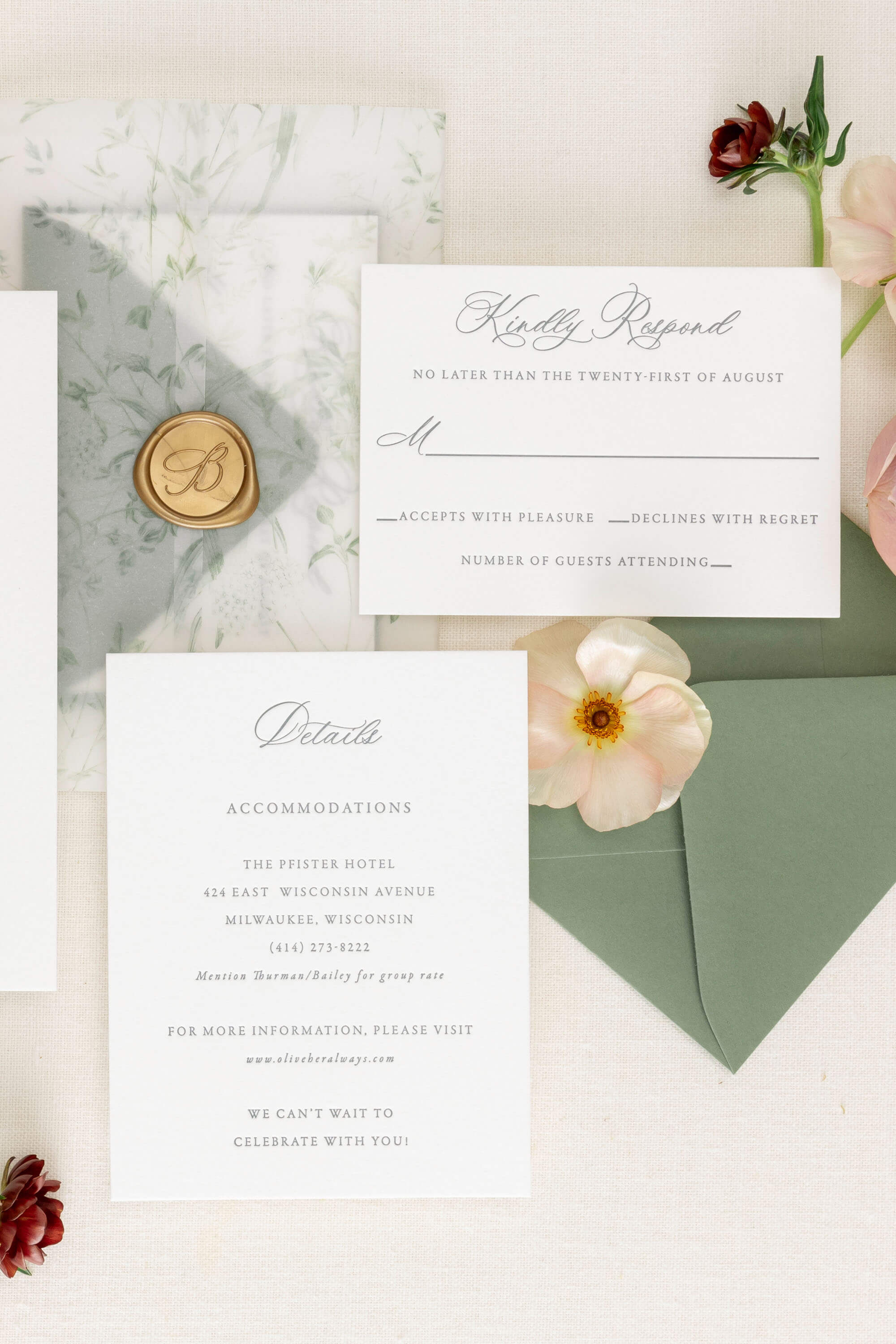 letter press Wedding invitation set with envelope, rsvp card, and floral decorations on a light background