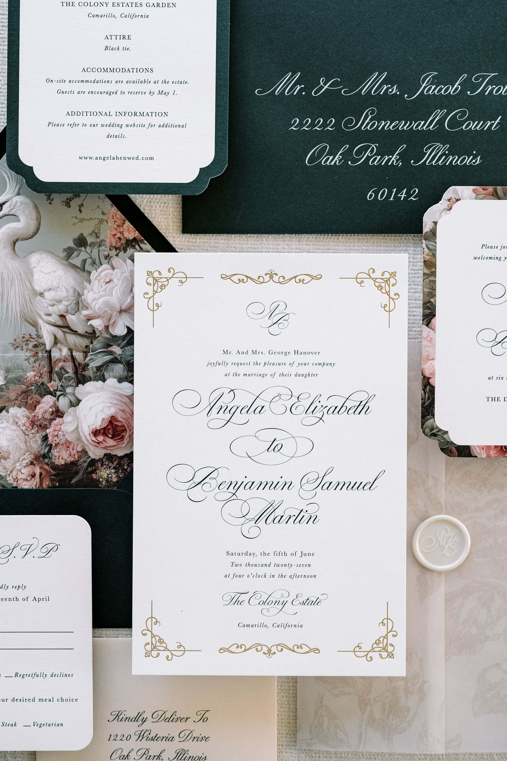 Vintage Wedding invitation set with floral decorations on a textured surface